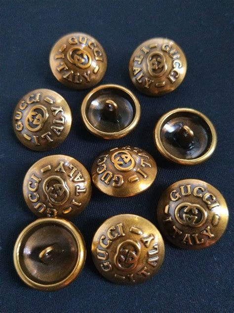 gucci gold buttons|More.